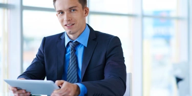 Businessman with a tablet in the office  